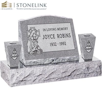 Granite slant headstone with vases